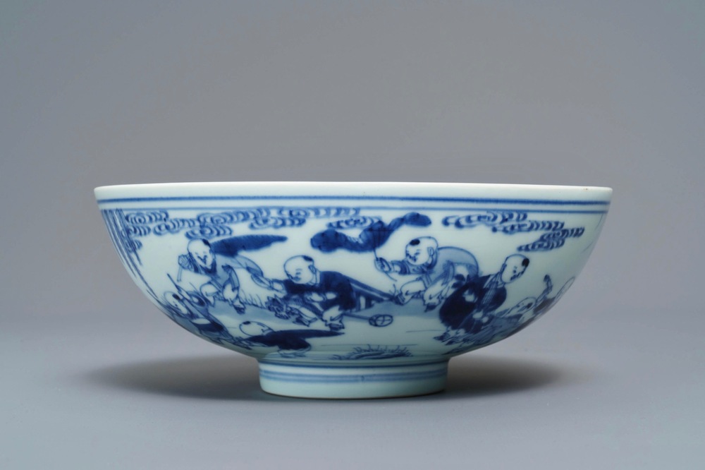 A Chinese blue and white 'playing boys' bowl, Yongzheng mark and of the period